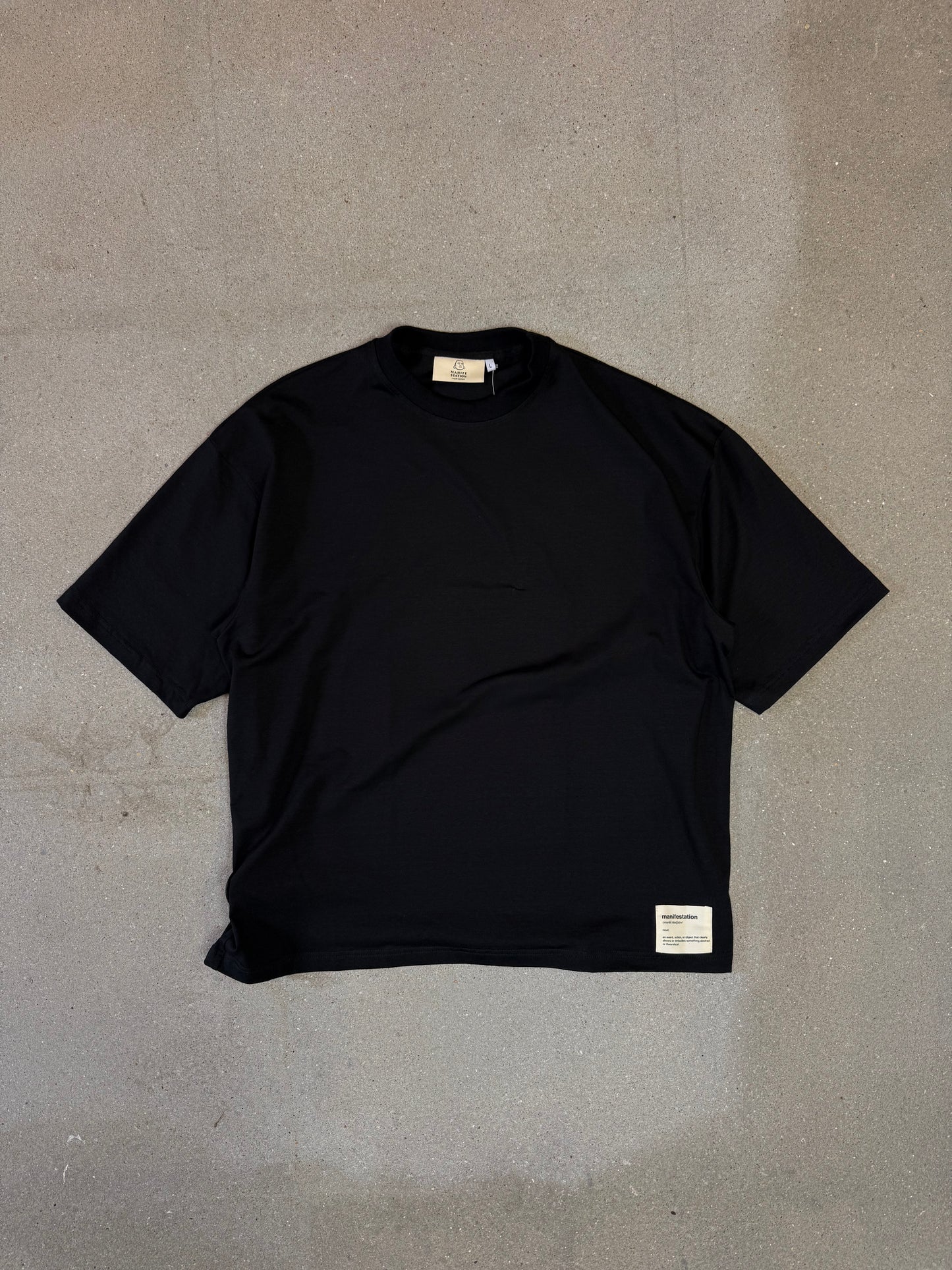 Schwarz/Weißes Manifestation Heavyweight Boxy Statement T-Shirt (hergestellt in NL 🇳🇱)